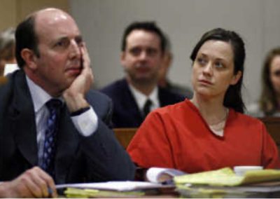 Mechele Linehan in court wearing an orange jump suit