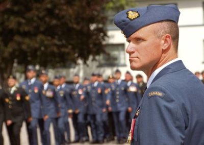 Russell Williams in uniform standing in front of other officers