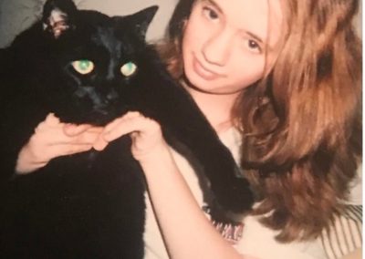 Jamie Fraley with a black cat