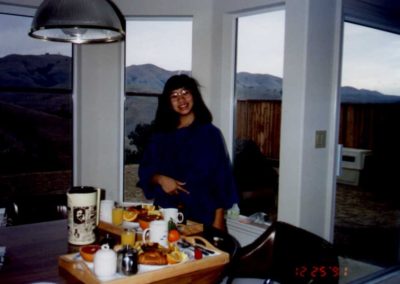 Jenny posing at the breakfast table.