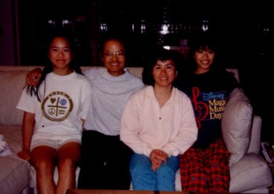 A Lin family portrait with Jenny (right), Mei-Lian (center-right), John (center-left), and Rhoda (left).