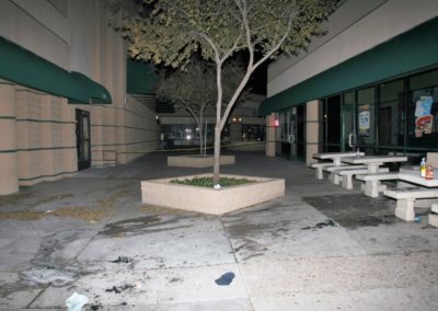 A crime scene photo of the benches and tables in the courtyard