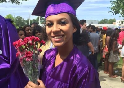 Asia Anderson at her high school graduation in 2014, months before the sextortion began.