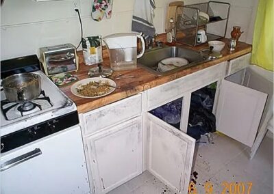 A crime scene photo of Hugues' kitchen.