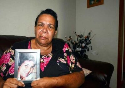 Muriel Craig holds a picture of her daughter, Colleen.