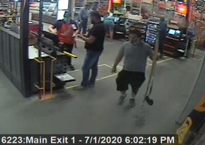 Surveillance footage shows Jonnathan buying a shovel and hoe at Home Depot on July 1st, 2020.