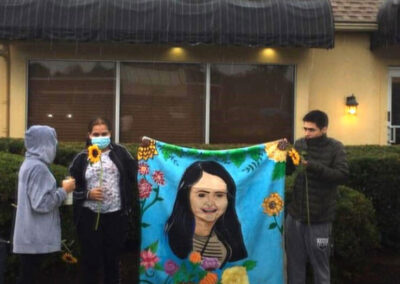 Lizzbeth’s loved ones and supporters in front of LoMonaco’s Ristorante.