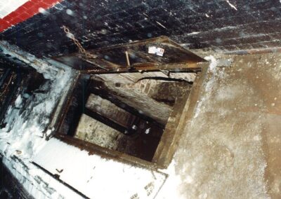 A steel door leading to the basement of 301 West 46th Street in February 2003.