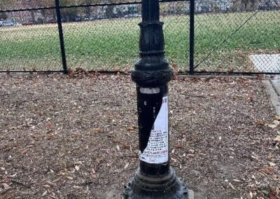 A ripped poster about Solomon’s case in St. Mary’s Park in the Bronx in November 2024.