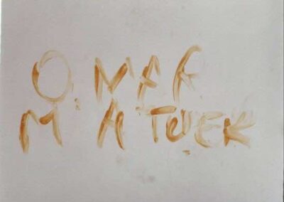 blood smear reading “OMAR M’A TUER"