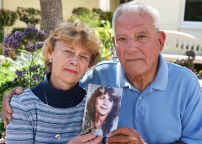 Lois and Art Serrin with a portrait of their daughter, Jodine.