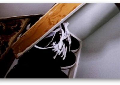 The killer’s sneakers, found behind Jodine’s door.