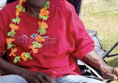 Darrel “Bubba” Johnson Sr. sitting at a campsite