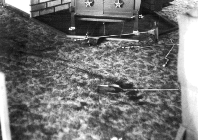 fireplace tools on floor of living room