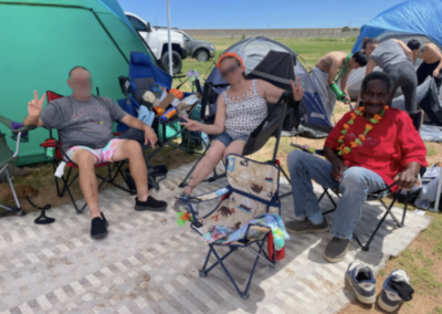 Darrel, Allie and Ernie at a campsite