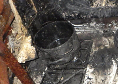 The pot on the stove that Dale theorizes had oil in it.