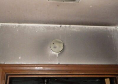 The smoke alarm upstairs