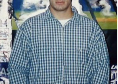 Keith in his dorm room