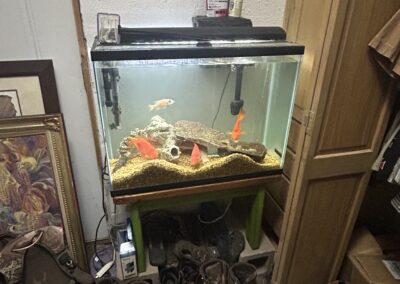 The fishtank and boots in the Casias' house