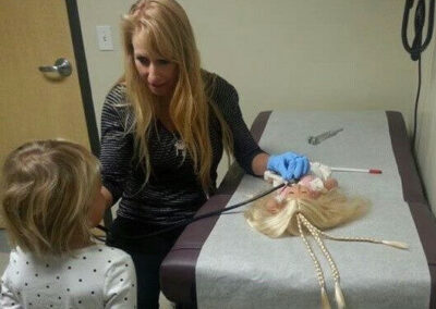 Laura working as a doctor