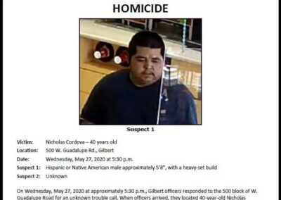 A reward poster with the photo of a suspect.