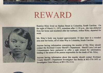 A reward poster for Beatrice Riley