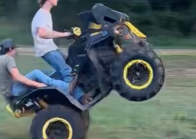 Tripp riding an ATV