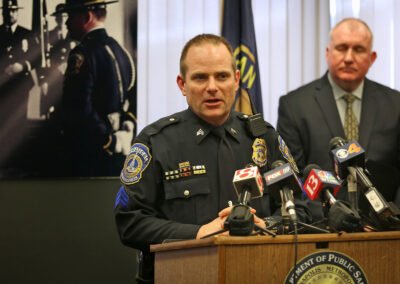 Captain Bill Carter speaking at a press conference for Carmen's case.