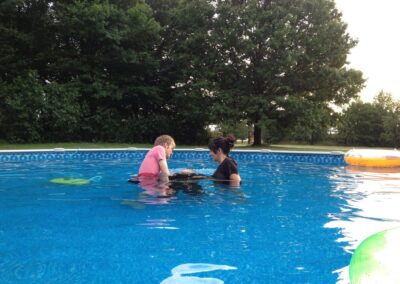 Justin Prawat and Brit Prawat during a baptism in 2012