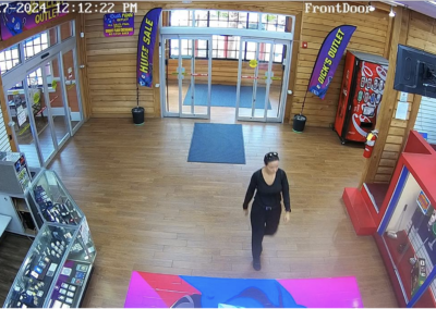 CCTV footage of Mica entering the pawn shop where she purchased a gun.