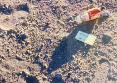 An empty Coke bottle found at the crime scene.