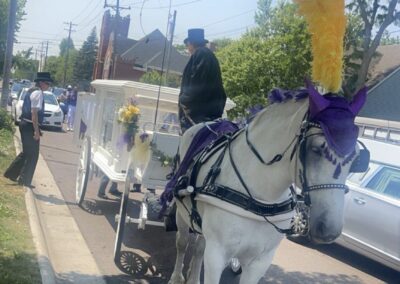 Horse and carriage pulling Lakesha’s casket at her funeral in Rockford, IL
